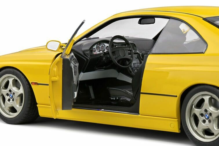 BMW 8 serie E31 CSI geel schaal 1:18 solido