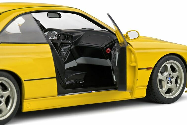 BMW 8 serie E31 CSI geel schaal 1:18 solido