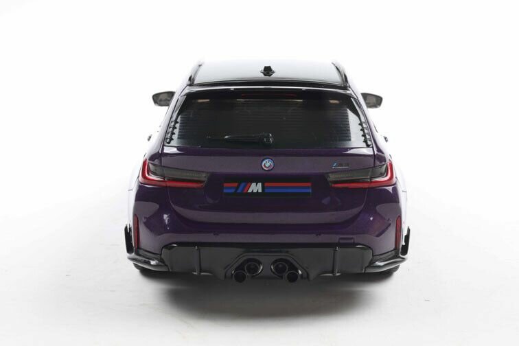 BMW M3 G81 performance purple pearl schaal 1:18 solido