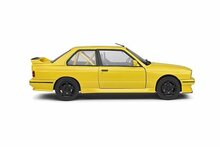 BMW E30 M3 geel schaalmodel met rolkooi 1:18